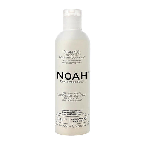 Jag Couture London Noah Anti-Amarillo Arandanos Shampoo 250ml bottle with blue and purple labeling, designed to reduce yellow tones.