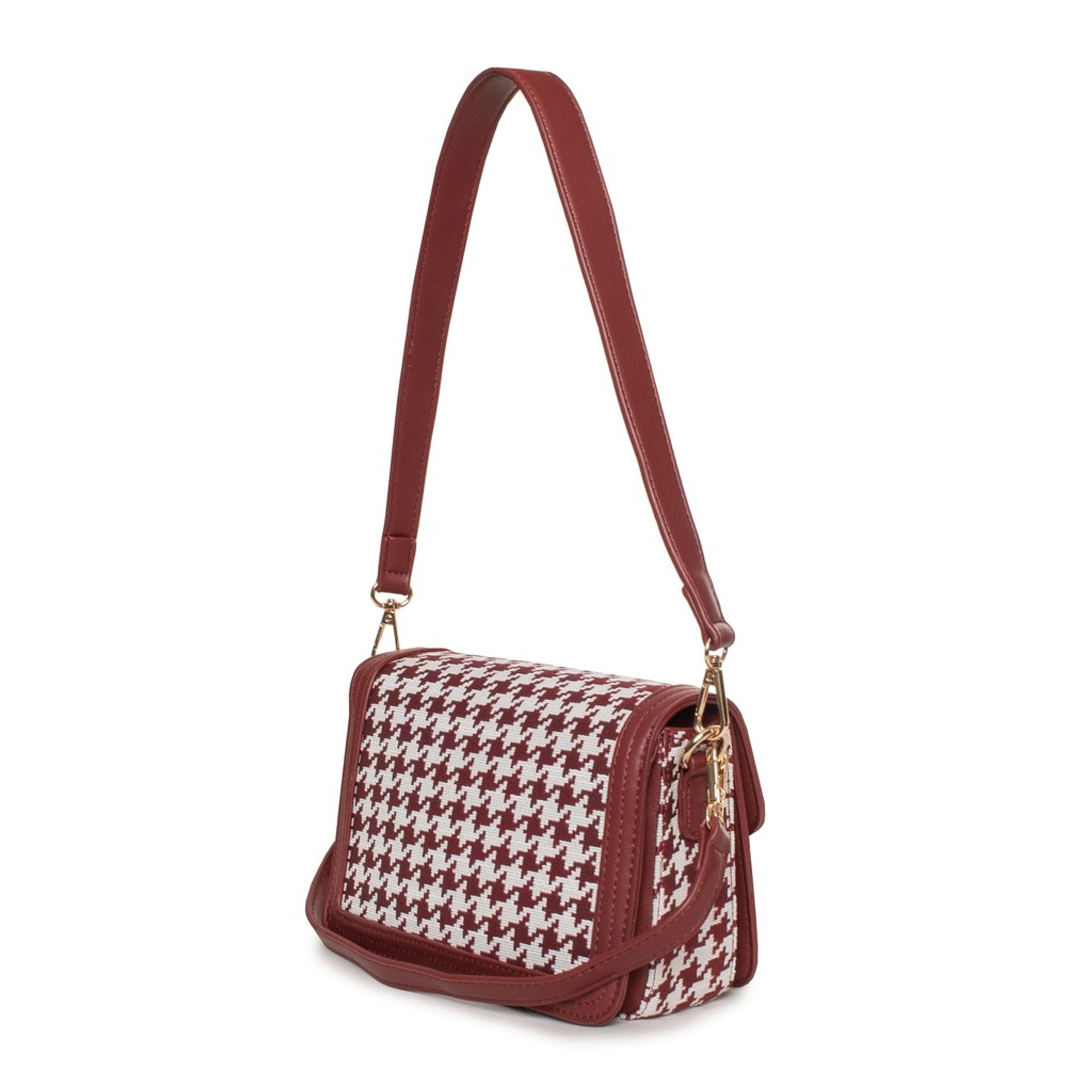 Egon Von Furstenberg x Jag Couture London-New York designer handbag in beige with gold accents and structured shape.