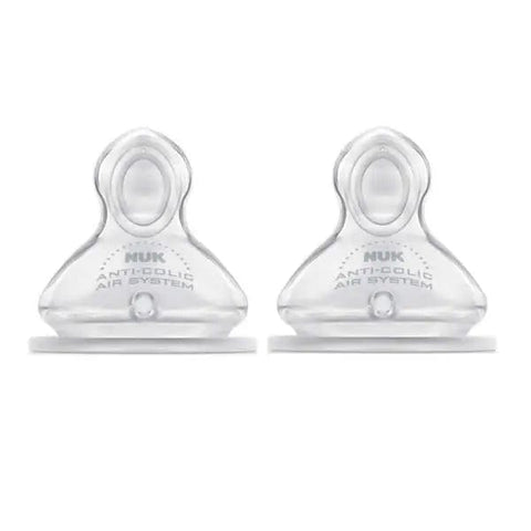 Two Nuk First Choice Size 2 silicone teats for baby bottles, by Jag Couture London New York, shown on a white background.