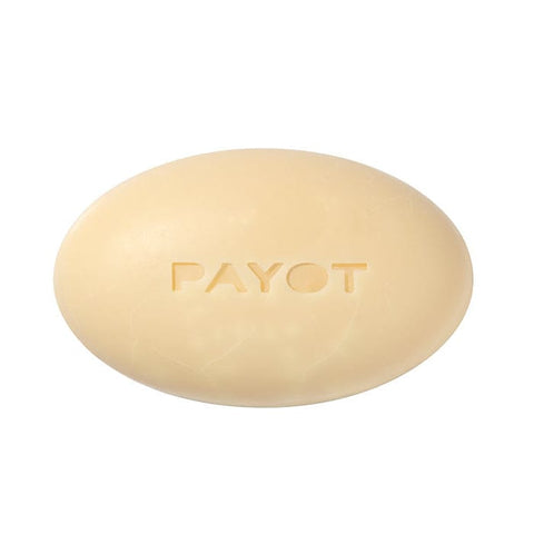 Payot Face and Body Herbarium Nourishing Massage Bar by Jag Couture London, 50g, showing the bar's herbal-infused appearance.