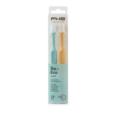 Two soft toothbrushes from PHB Time To Care by Jag Couture London and New York, suitable for gentle oral cleaning.