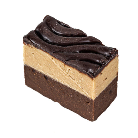 Dark chocolate praline slice with hazelnut and almond layers, topped with dark chocolate, from Jag Couture London - New York.
