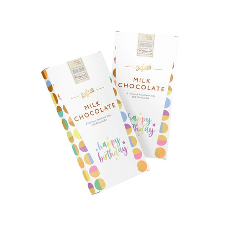 Jag Couture London milk chocolate bar in birthday message carton box, wrapped in elegant packaging with "Happy Birthday" lettering.