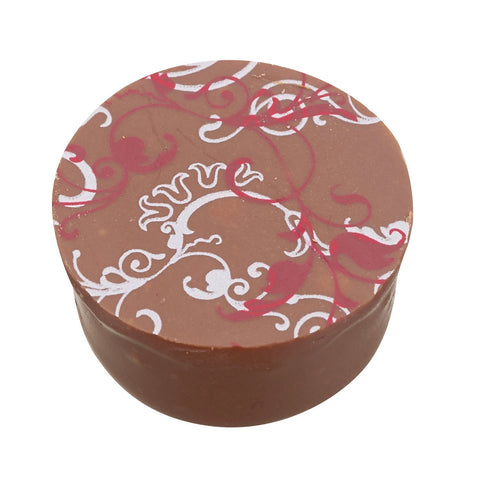 Raspberry and cranberry milk chocolate with flavored crème fraîche, Jag Couture London - New York, 14g bar on a white background