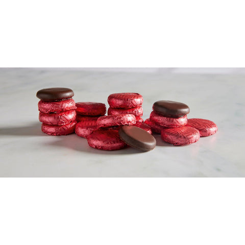 Raspberry crème dark chocolate fondants wrapped in magenta foil, 120 pieces, from Jag Couture London - New York.