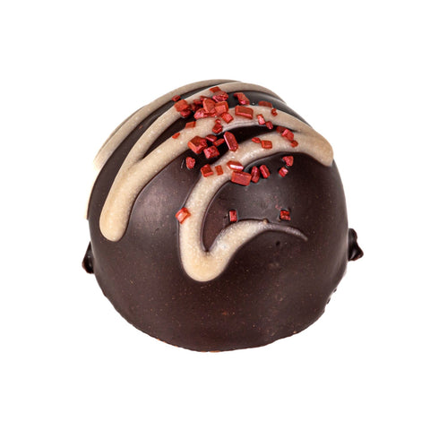 Raspberry Fruit Cream by Jag Couture London, dark chocolate flavored fondant filling in a 13g portion, shown in a close-up image.