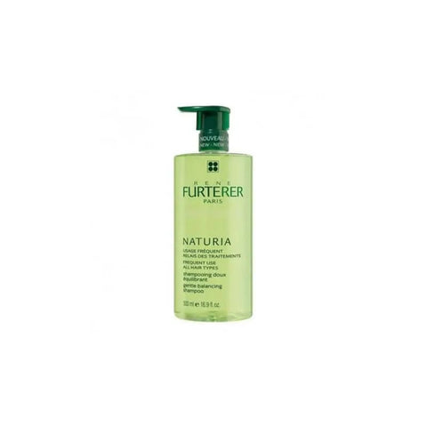 Rene Furterer Naturia Extra Gentle Shampoo bottle, 500ml, with white and green label, placed on a bathroom shelf.