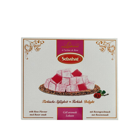 Rose-flavored Turkish delight from Jag Couture London - New York in an elegant gift box, showcasing soft, pink Turkish delight pieces.
