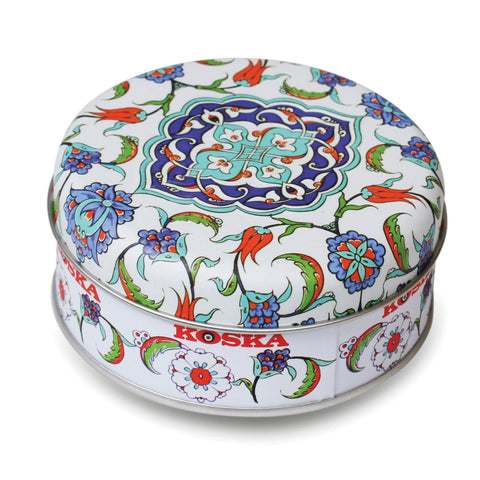 Round tin of rose and lemon Turkish Delight by Jag Couture London - New York, showcasing colorful, sweet Turkish confections inside a decorative tin.