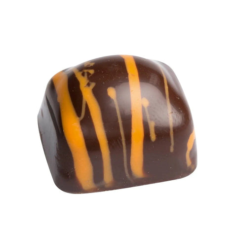 Jag Couture London Safari orange-flavored praline in dark chocolate, 18.2g, showcasing the glossy chocolate coating and vibrant orange filling.