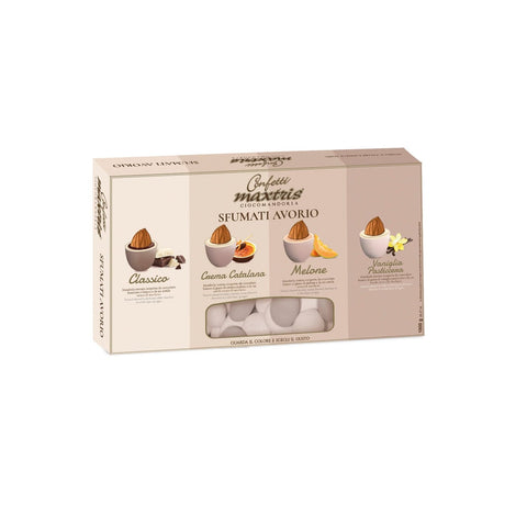 Sfumati Avorio toasted almonds coated in milk or dark chocolate flavor mix with ivory-colored sugar, by Jag Couture London New York.