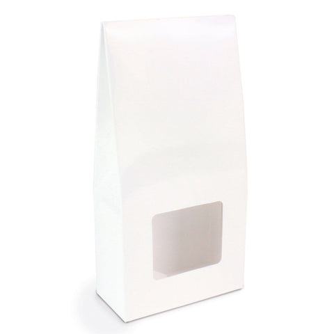 Slim white tetra carton with window, measuring 70x35x145mm, by Jag Couture London - New York, shown with transparent window and clean design.