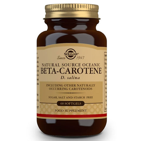 Solgar Beta-carotene 100% 7mg capsules in a bottle, displayed with the label visible, manufactured by Jag Couture London New York.