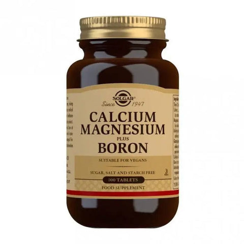 Solgar Calcium Magnesium Plus Boron supplement bottle with 100 tablets, featuring white tablets in a clear container.