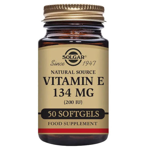 Solgar Vitamin E 134mg 200 IU softgels in a bottle, displayed on a neutral background, highlighting supplement packaging.