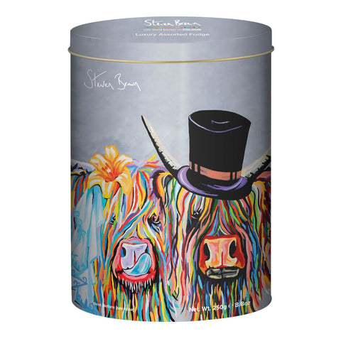Assorted Steven Brown McHappily Ever After fudge in a decorative oval tin, by Jag Couture London New York.