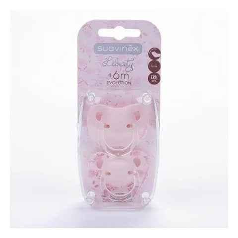 Suavinex Vintage Evolution latex baby pacifier with orthodontic nipple in pink for 6 months, shown with two pacifiers.
