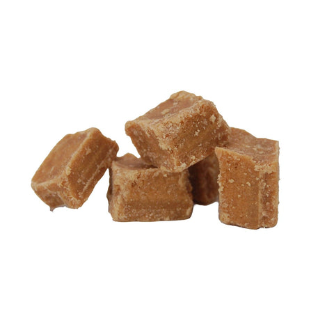 Hand-broken cubes of flavored Tablet fudge by Jag Couture London - New York, showcasing colorful, textured fudge pieces.