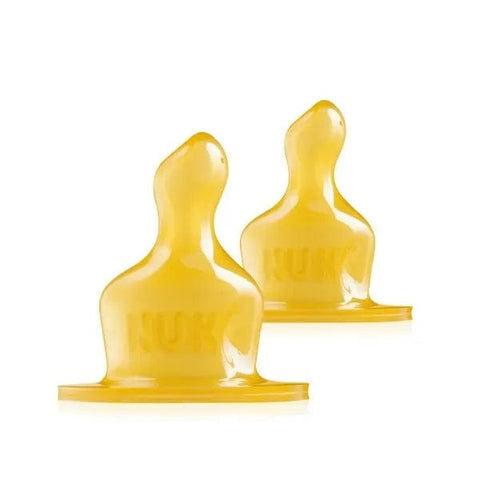 Two Nuk latex milk teats T-1 for baby bottles, shown in clear view with soft, flexible latex material for infant feeding.