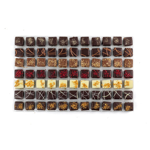 Assorted French-style caramel chocolates from Jag Couture London, including salted caramel, milk caramel, raspberry, bresilienne, and lemon.