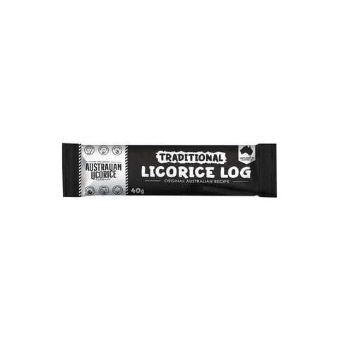 Traditional licorice log from Jag Couture London New York, showcasing a dark, textured licorice confection with a smooth surface.