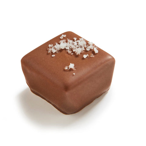 Jag Couture London Verne salted caramel ganache in milk chocolate, 11.2g, showing a smooth, glossy chocolate piece with caramel filling