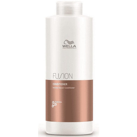 Jag Couture London New York Wella Fusion Intense Repair Conditioner 1000ml bottle, creamy hair care product for damaged hair.