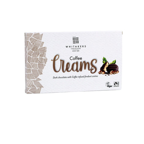 Dark chocolate-covered coffee fondant creams by Whitakers in a carton, from Jag Couture London New York.