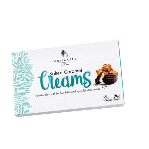 Jag Couture London - New York Whitakers dark chocolate-covered salted caramel fondant creams in a carton, showcasing creamy caramel centers.