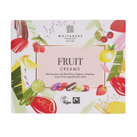 Whitakers foiled dark chocolate fruit creams from Jag Couture London in a carton, featuring black cherry, raspberry, strawberry, lemon, and lime.