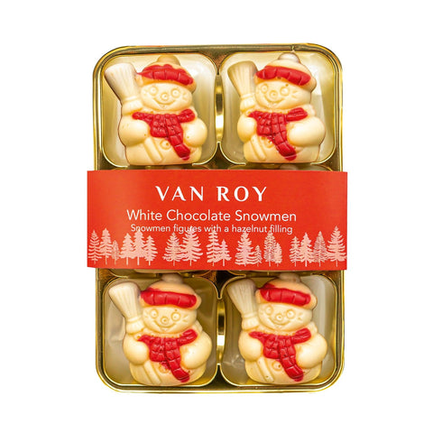 White chocolate snowmen figures with hazelnut filling in cello pack, crafted by Jag Couture London - New York.
